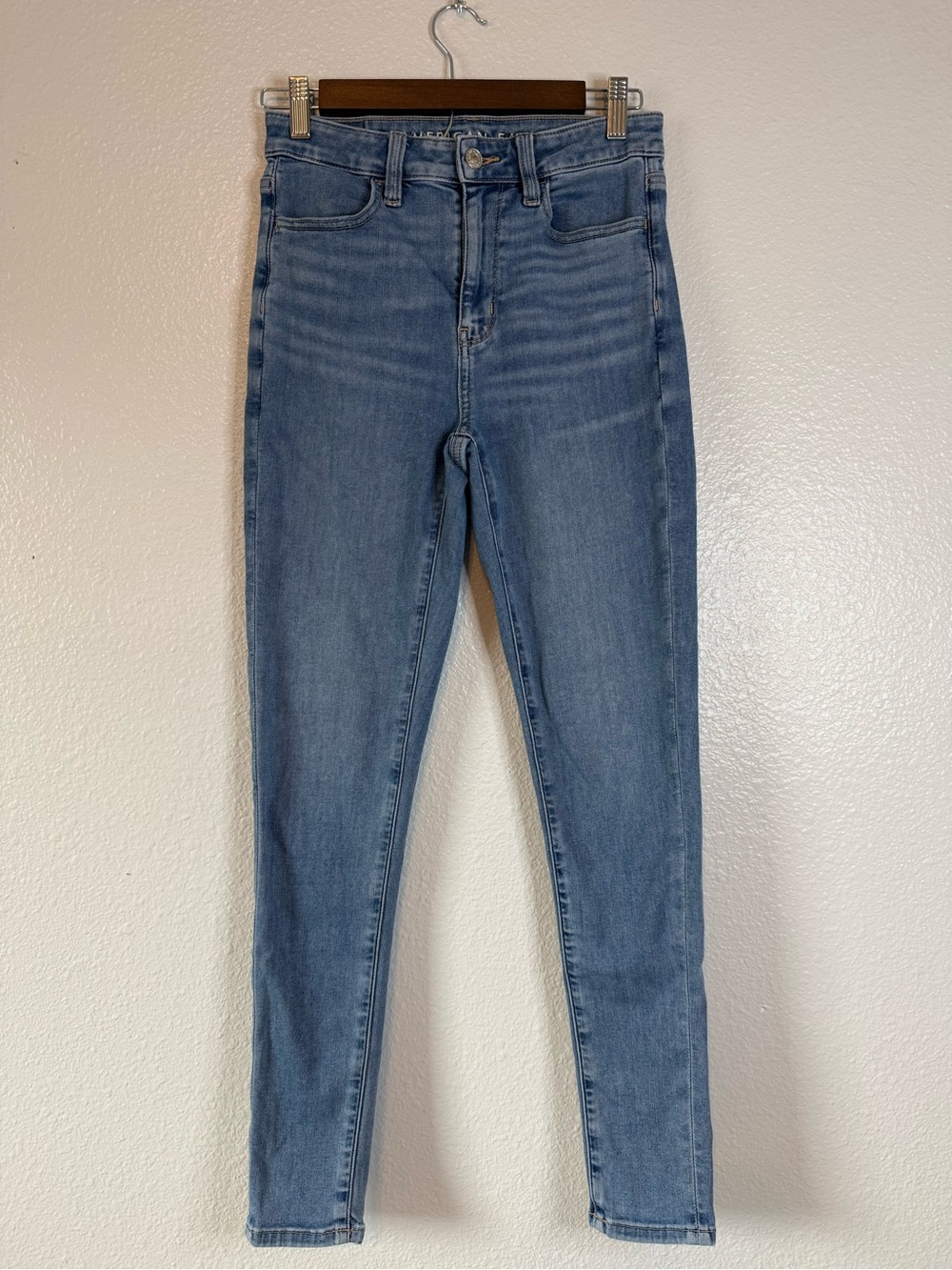 American Eagle Super High Rise Jegging Size 0 Light Wash Next Level Stretch